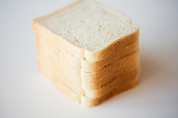 close up of white toast bread on table