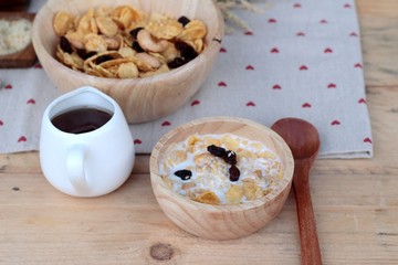 Corn flake with currant dried fruit ,cashew nuts and milk.
