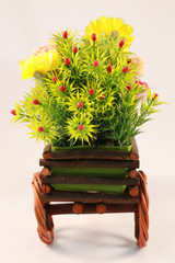 Beautiful and colorful flower bouquet in wooden basket in car sh