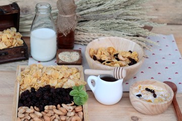 Corn flake with currant dried fruit ,cashew nuts and milk.