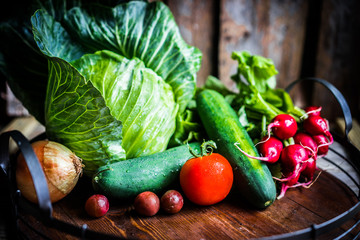 Fresh vegetables on wooden background