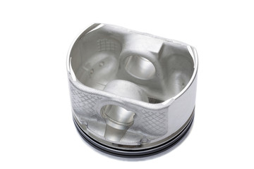 Aluminum car piston isolated over white background