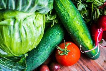 Fresh vegetables on wooden background