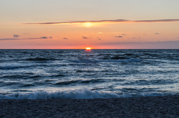 Baltic sea coast at sunset in Rowy, near Ustka, Poland