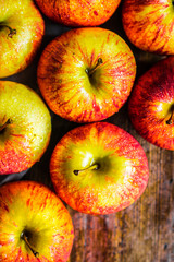 Colorful apples on wooden background