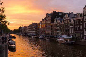 Stunning sunset in Amsterdam and view on buildings, Netherlands