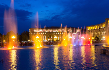 Fototapeta na wymiar Color-musical fountains in the central Republic Square. The city Yerevan has a population of 1 million people