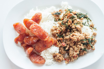 Rice topped with stir-fried pork and basil