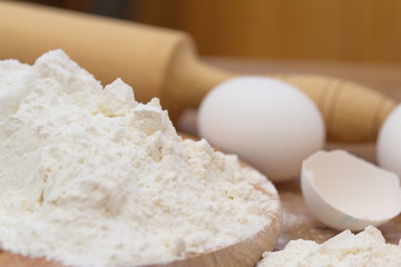 Dough preparation. Baking ingredients: egg and flour.