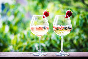 Summer cocktail with fresh berries