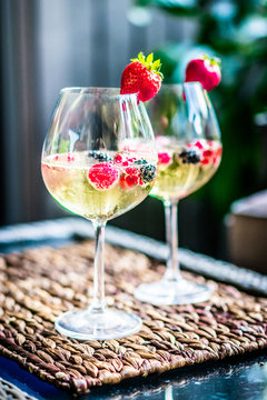 Summer cocktail with fresh berries