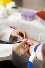 Taking blood in laboratory