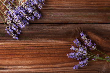 Lavender flowers on vintage wooden boards background