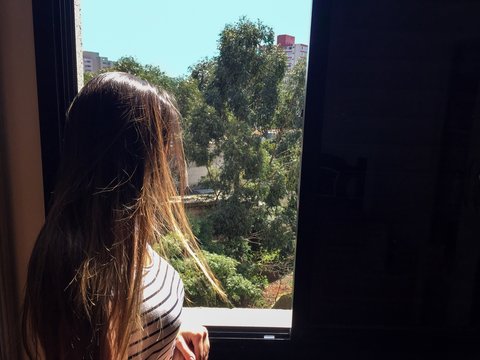 Girl staring outside
