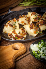 Dumplings with meat, onion and bacon.