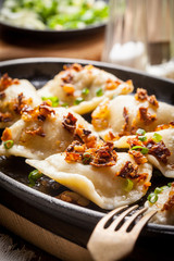 Dumplings with meat, onion and bacon.