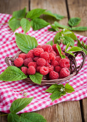  Ripe raspberry with leaf