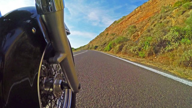 classic bike on the road seen from the fork