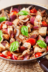 Chicken with onion and cherry tomatos