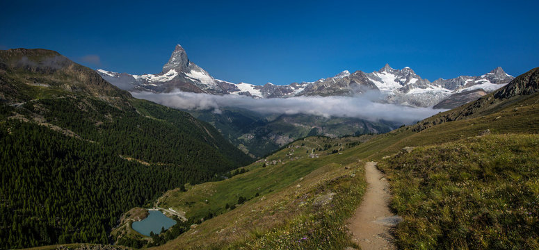 Swiss beauty, path above valley and Matterhorn