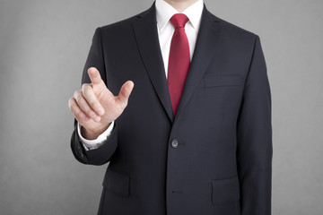 Businessman pointing or touching something
