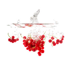 Currants splash on water, isolated on white background. Use for fresh drinks advertising.