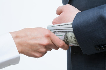 Giving a bribe into a sleeve