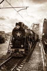 old black steam locomotive in Russia