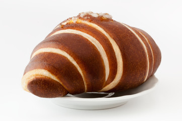 Croissant-flavored jam on white plate. Meal, breakfast morning. Clipping paths.