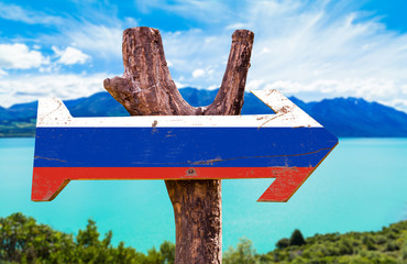 Russia Flag wooden sign with lake background
