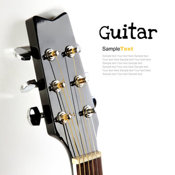 Acoustic guitar head on white background