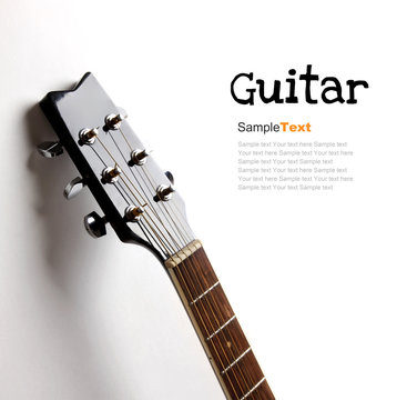 Acoustic guitar head on white background