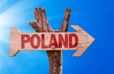 Poland wooden sign with sky background