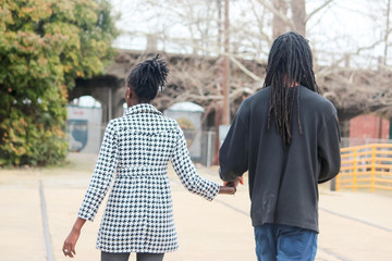 African-American Couple/ African-American couple walking and holding hands