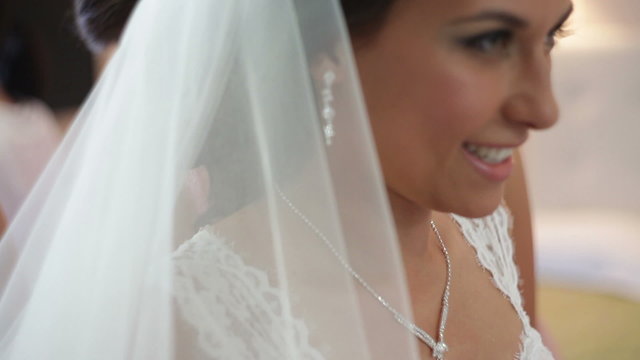 Brides wear a necklace around neck
