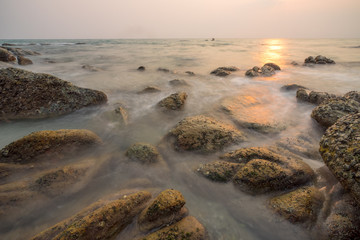 Rock in the sea and the soft waves