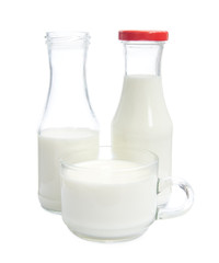 Milk bottle and milk glass on white background.