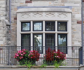 front porch with flower pots