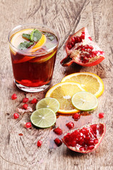glass of pomegranate juice with fresh fruits