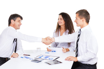 Fototapeta premium A group of businessmen discussing the policy of the company in t