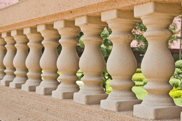 The detail with depth of field of balustrade with beige sandstone Columns.
