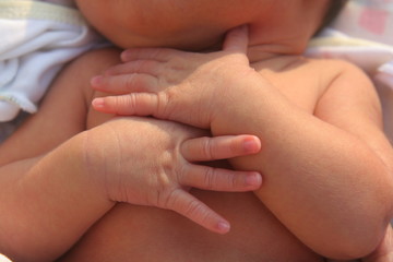 Obraz na płótnie Canvas Baby's Hand 