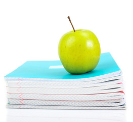 apple on writing-books. school concept