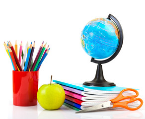 Naklejka premium Globe, notebook stack and pencils. Schoolchild and student studi