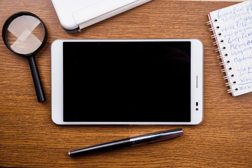 Gadget on wooden desk