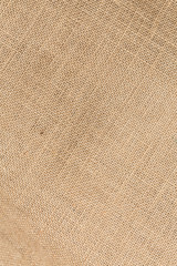Fototapeta na wymiar Sack textured brown canvas fabric as background