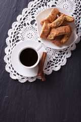 coffee and cookies with almonds. Vertical top view
