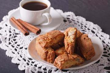 cantuccini with almonds and coffee with cinnamon. horizontal
