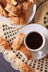 coffee and cookies cantuccini with almonds closeup. vertical top view 
