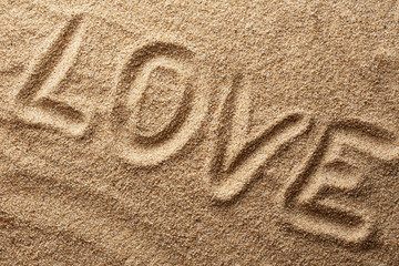 Word love on sand